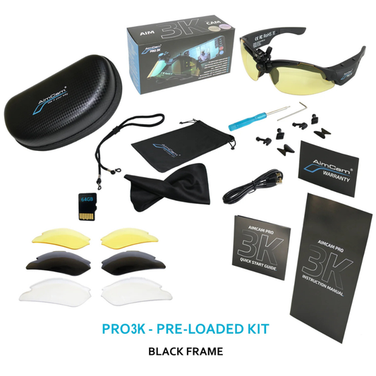 Aimcam Pro 3K wraparound sunglasses in a black frame with yellow lenses, shown with a black hard case, carrying pouch, instruction manual, quick start guide, lens filters, and accessories on a white background.